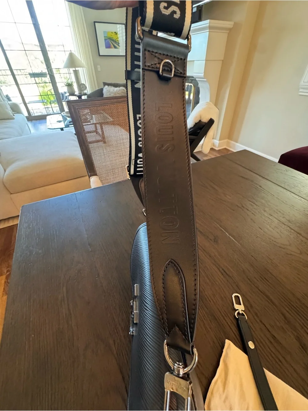 Brand new Louis Vuitton Black Buci bag with 2 Louis Vuitton straps.